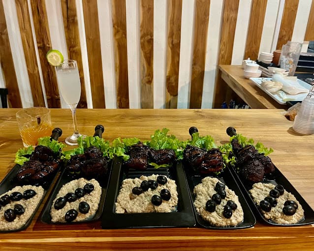 Plated dishes at the Hotel Ransam rooftop restaurant